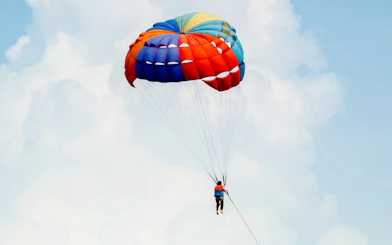 Parasailing adventure during Pattaya to Coral Island tour.