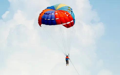 Parasailing adventure during Pattaya to Coral Island tour.