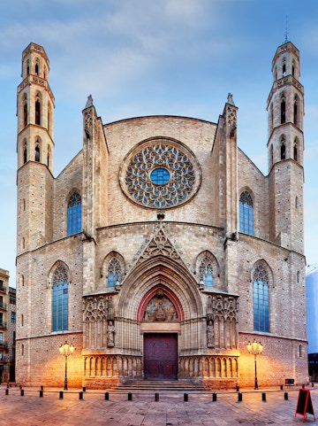 Santa Maria del Mar facade with rose window and twin towers in Barcelona.