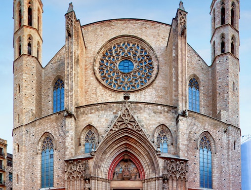 Santa Maria del Mar facade with rose window and twin towers in Barcelona.