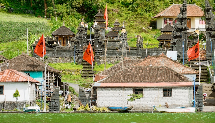 View of the ancient village Trunyan and Hindu Temple from Lake Batur, Bali, Indonesia