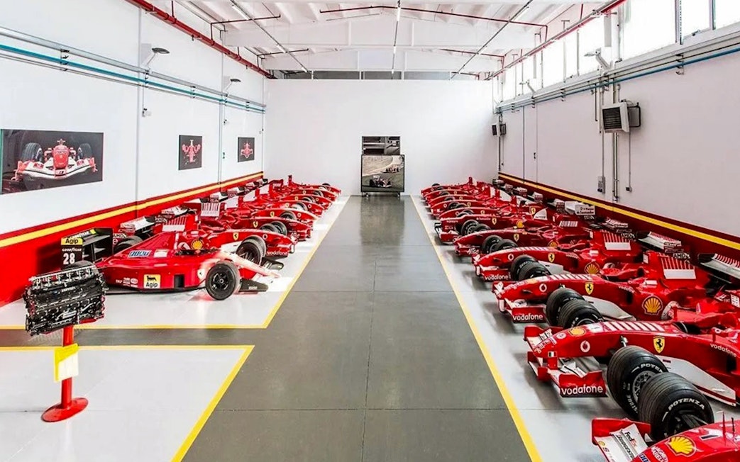 Ferrari race cars lined up at Ferrari Museum, Maranello.