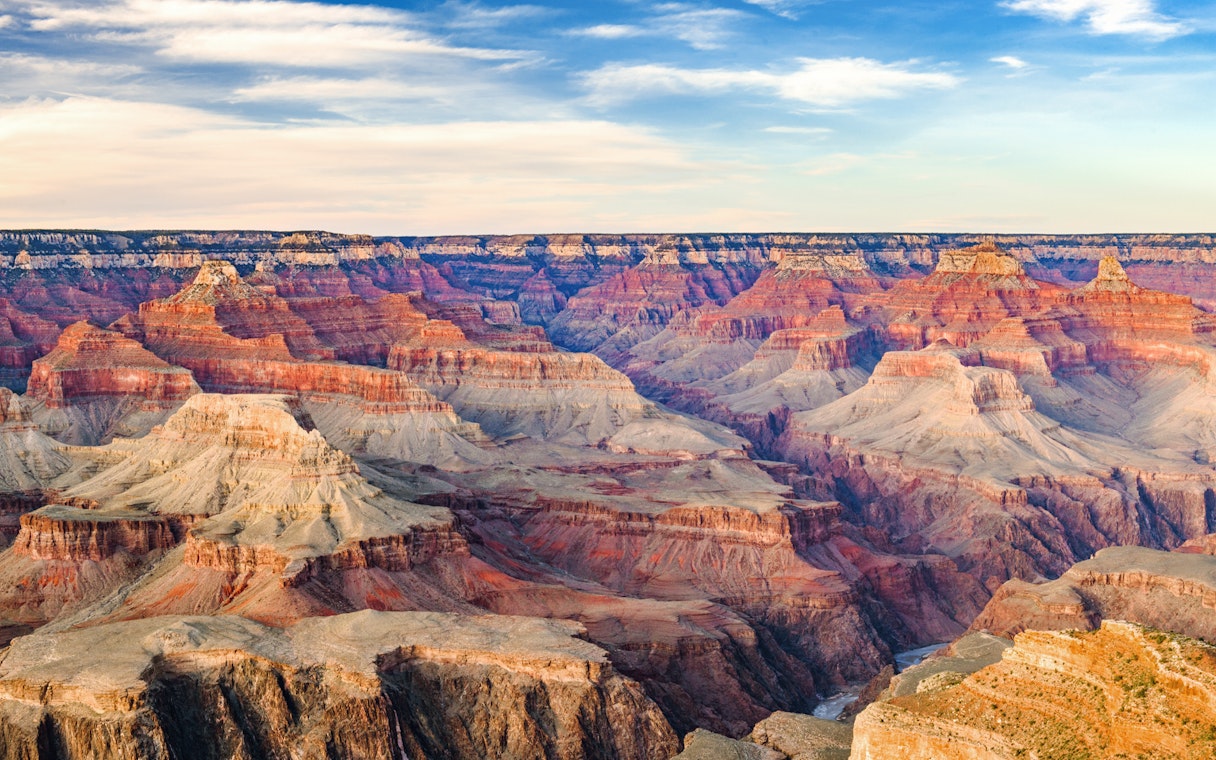 Panoramic view of the Grand Canyon's red rock formations.