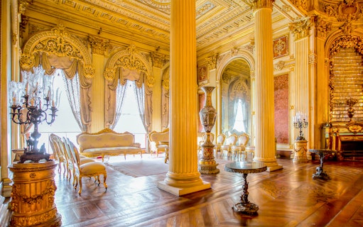 Sufera Hall interior with ornate columns and luxurious furnishings, Dolmabahçe Palace, Istanbul, Turkey.