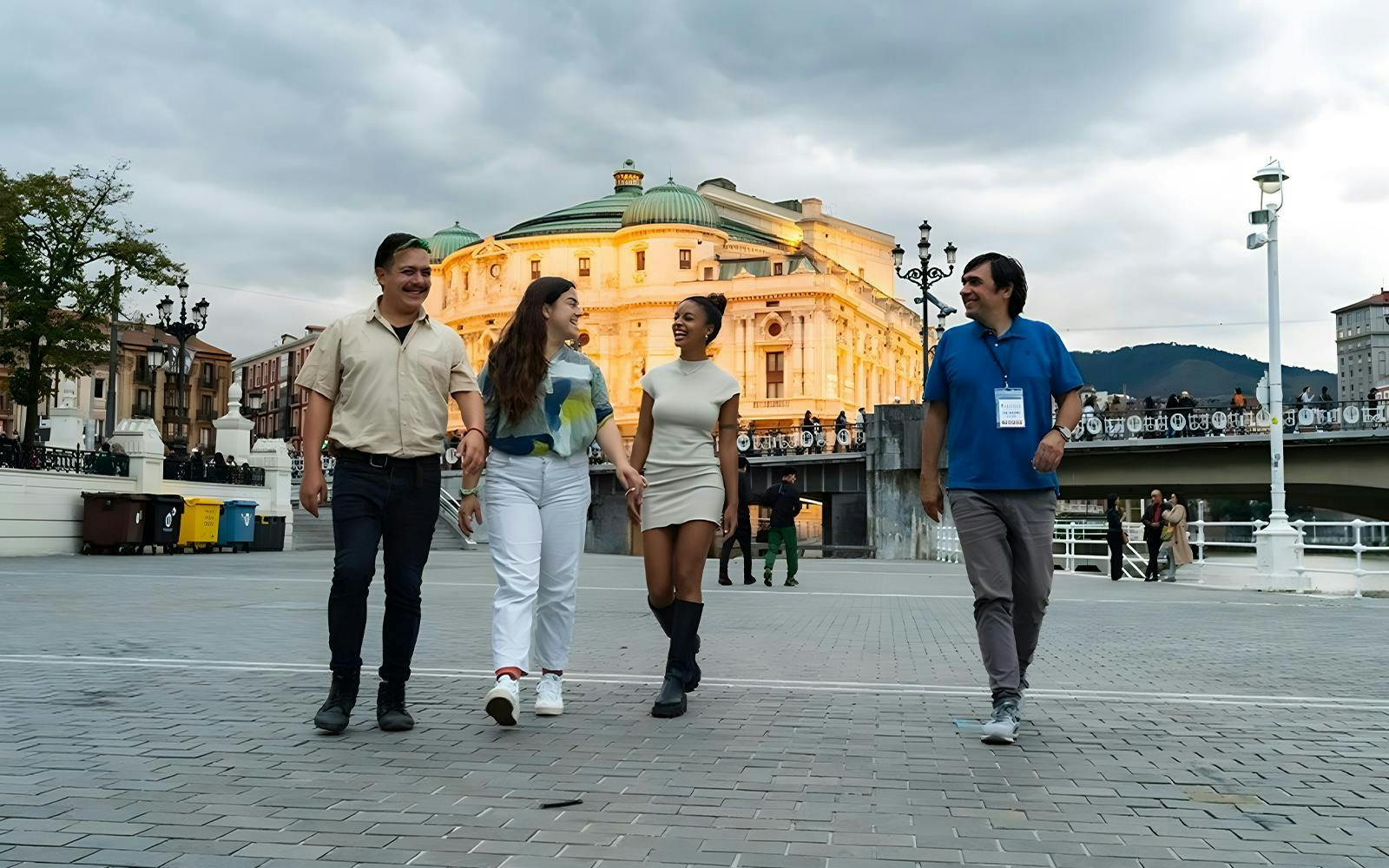 People walking in front of Teatro Arriaga in Bilbao, Spain.