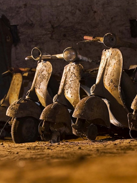 Vintage scooters in the Bourbon Tunnel, Naples guided tour.
