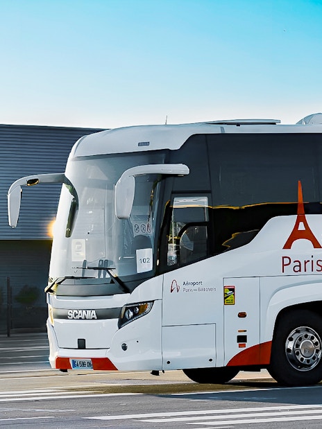 Shuttle bus at Beauvais Airport offering round-trip service to Paris.