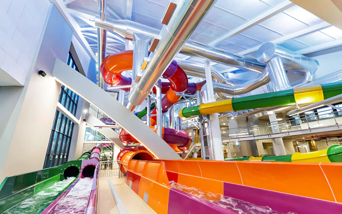 Colorful water slides inside Aquashow Indoor Park.