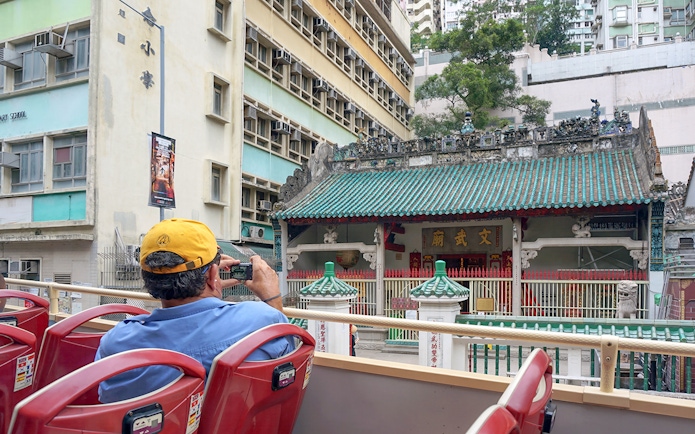 Guest photographing Man Mo Temple from Big Bus tour in Hong Kong.