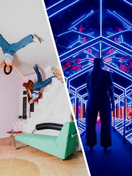 Guests exploring optical illusions and neon lights at Amaze Amsterdam.