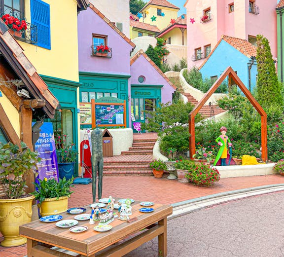 Colorful buildings and art installations at Petite France, Seoul to Nami Island tour.