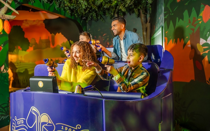 Visitors enjoying interactive ride at Cadbury Chocolate Quest, Cadbury World.