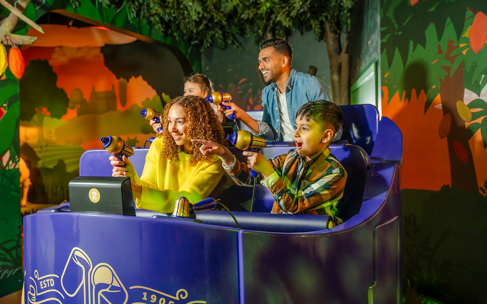 Visitors enjoying interactive ride at Cadbury Chocolate Quest, Cadbury World.