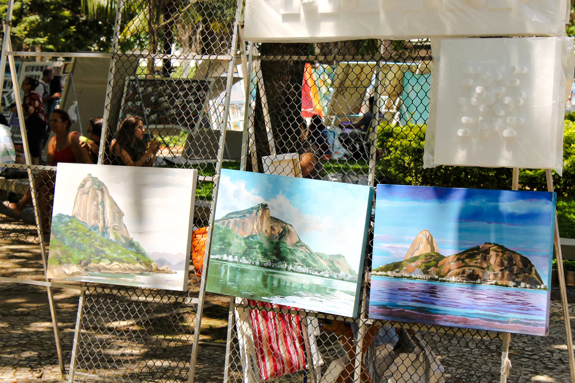 Paintings of Sugarloaf Mountain displayed at Ipanema Hippie Fair, Rio de Janeiro.