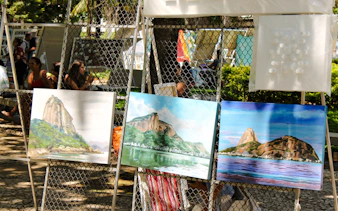 Paintings of Sugarloaf Mountain displayed at Ipanema Hippie Fair, Rio de Janeiro.