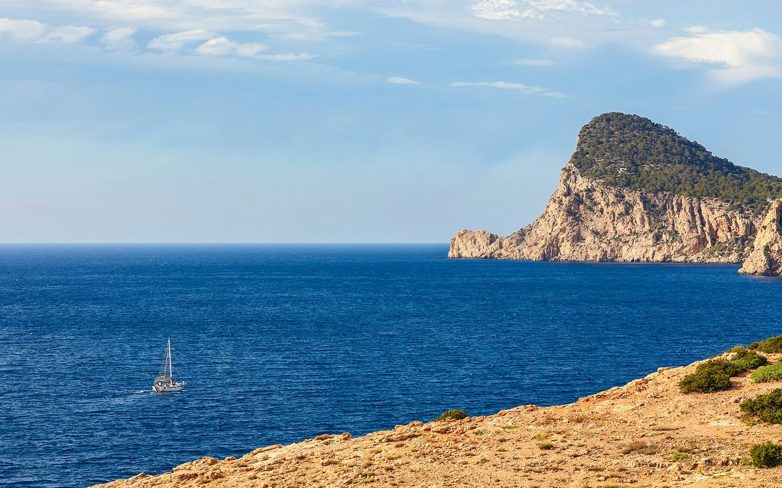 Sailboat near Cape Cap Nuno, Ibiza, Balearic Islands, Spain.