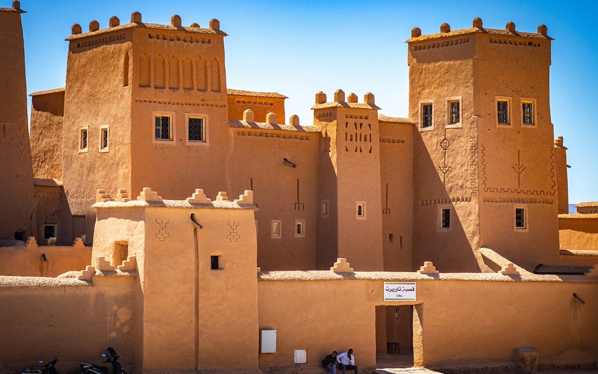 Kasbah in Ouarzazate, Morocco, with traditional architecture on a sunny day.
