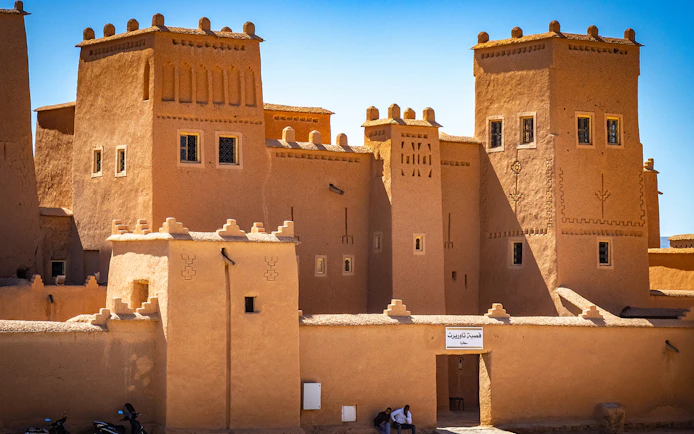 Kasbah in Ouarzazate, Morocco, with traditional architecture on a sunny day.