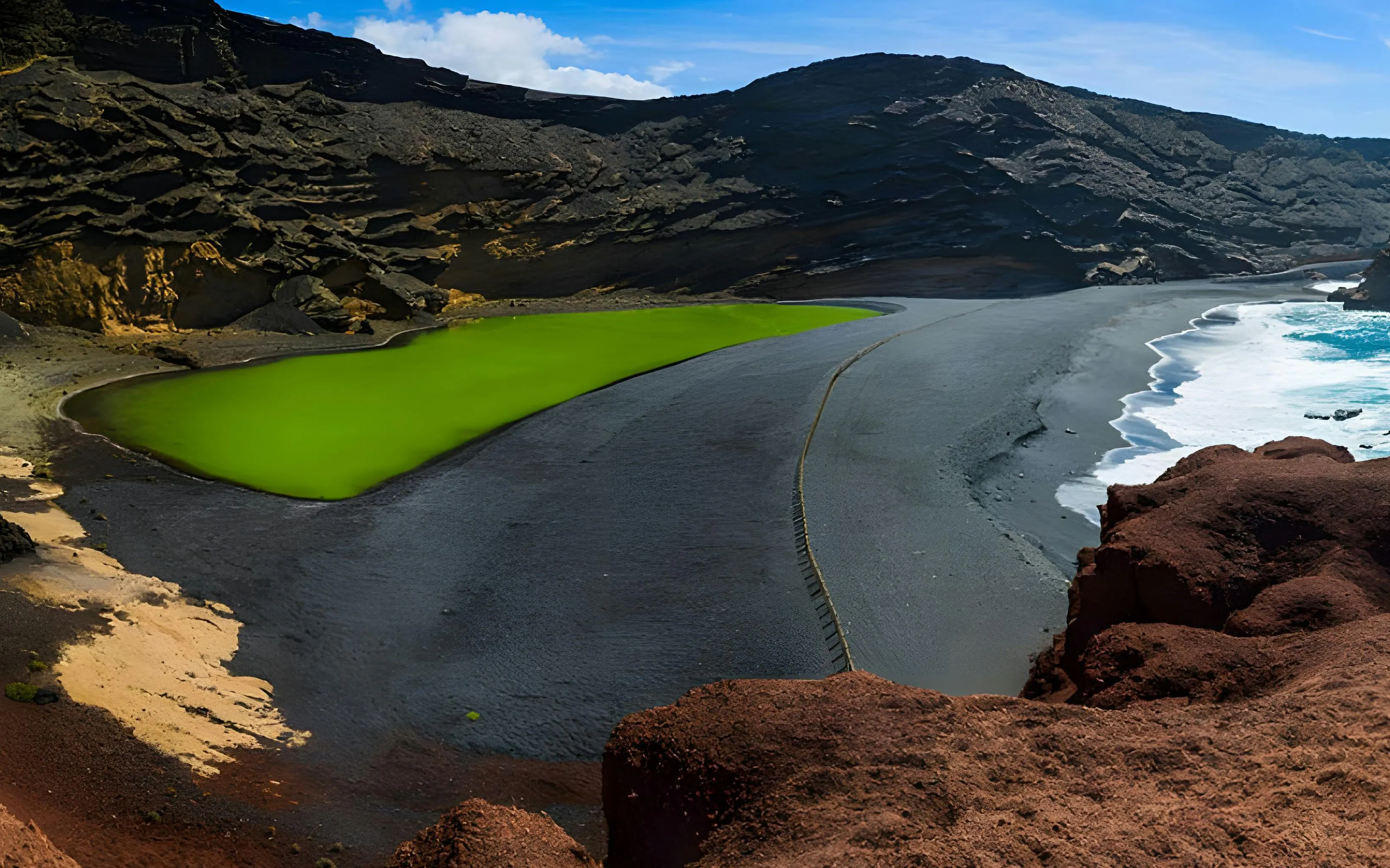 Aerial view of El Golfo's green lagoon and black sand beach, Lanzarote.