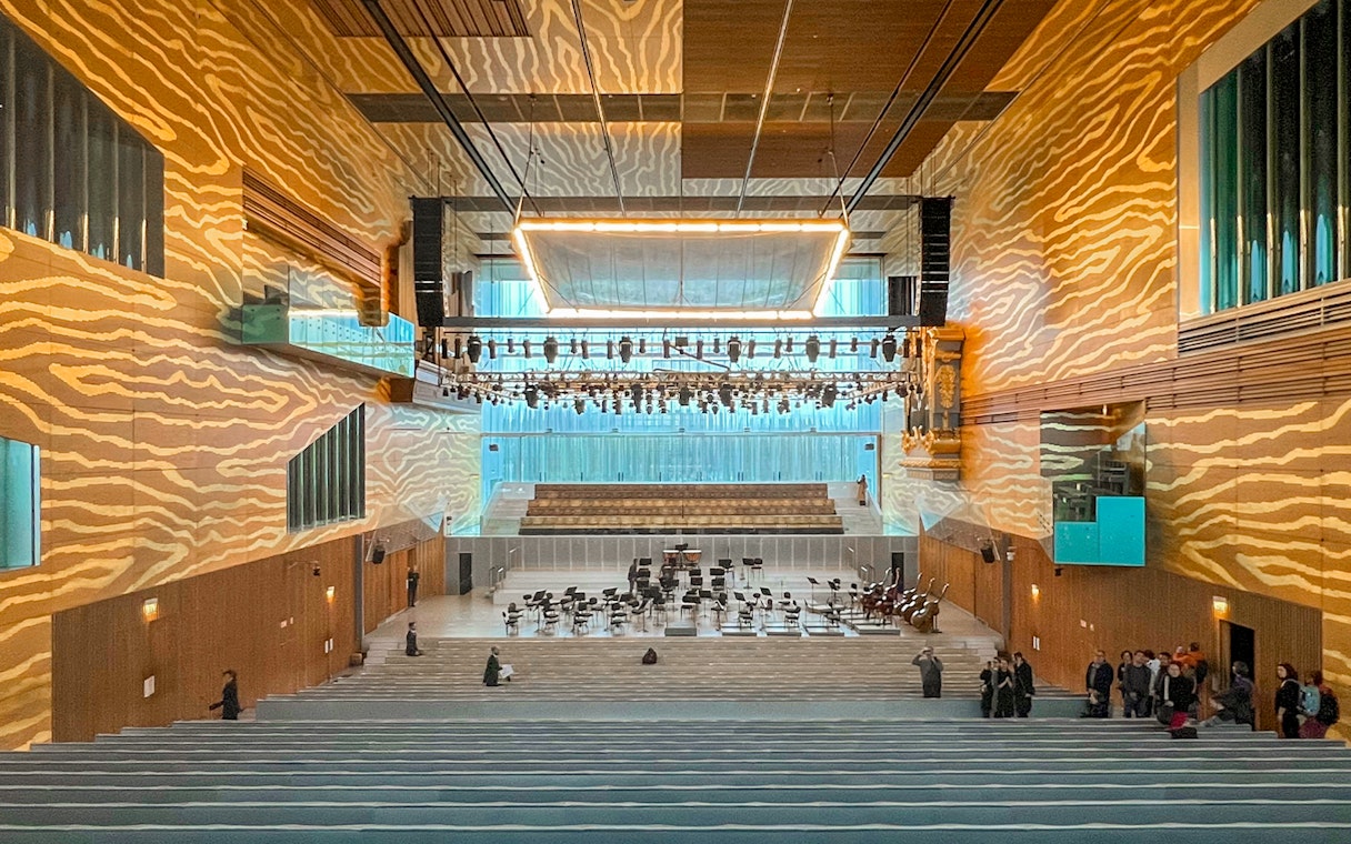 Interior of Casa de la Música concert hall in Porto, featuring stage and seating area.