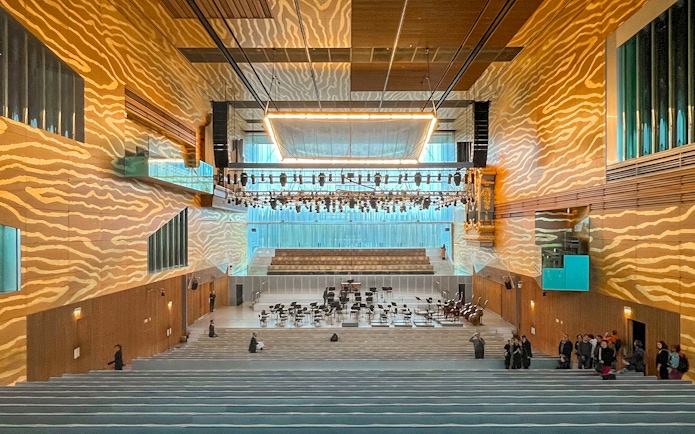 Interior of Casa de la Música concert hall in Porto, featuring stage and seating area.