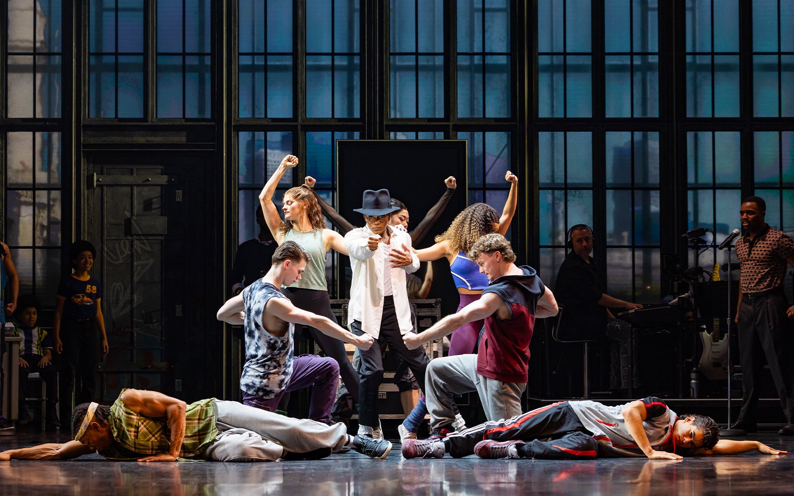 Performers dancing on stage during MJ the Musical in Brisbane.