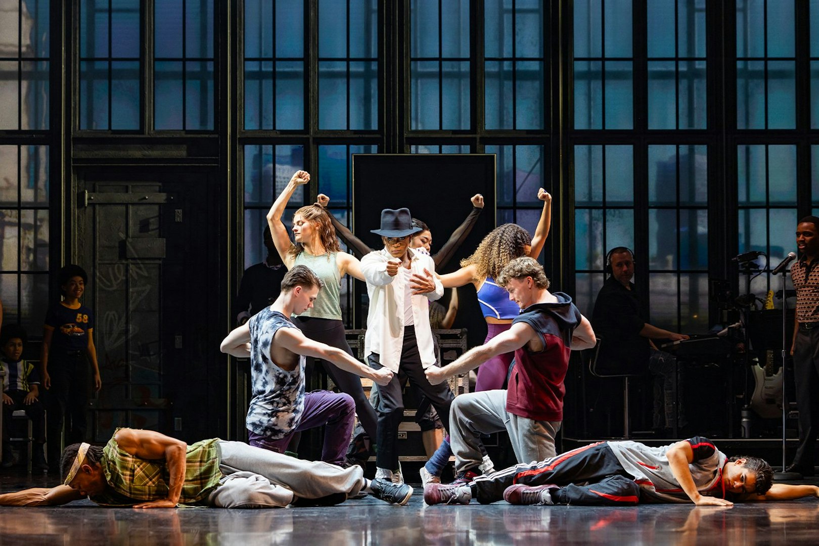 Performers dancing on stage during MJ the Musical in Brisbane.