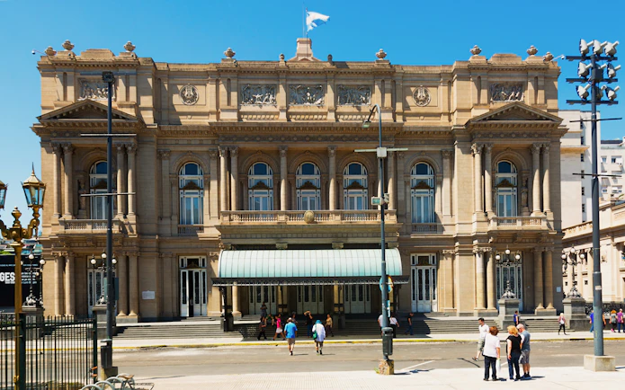 Tourists standing outside Teatro Colón in Buenos Aires, Argentina.