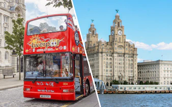 Red double-decker tour bus in front of the Royal Liver Building, Liverpool.