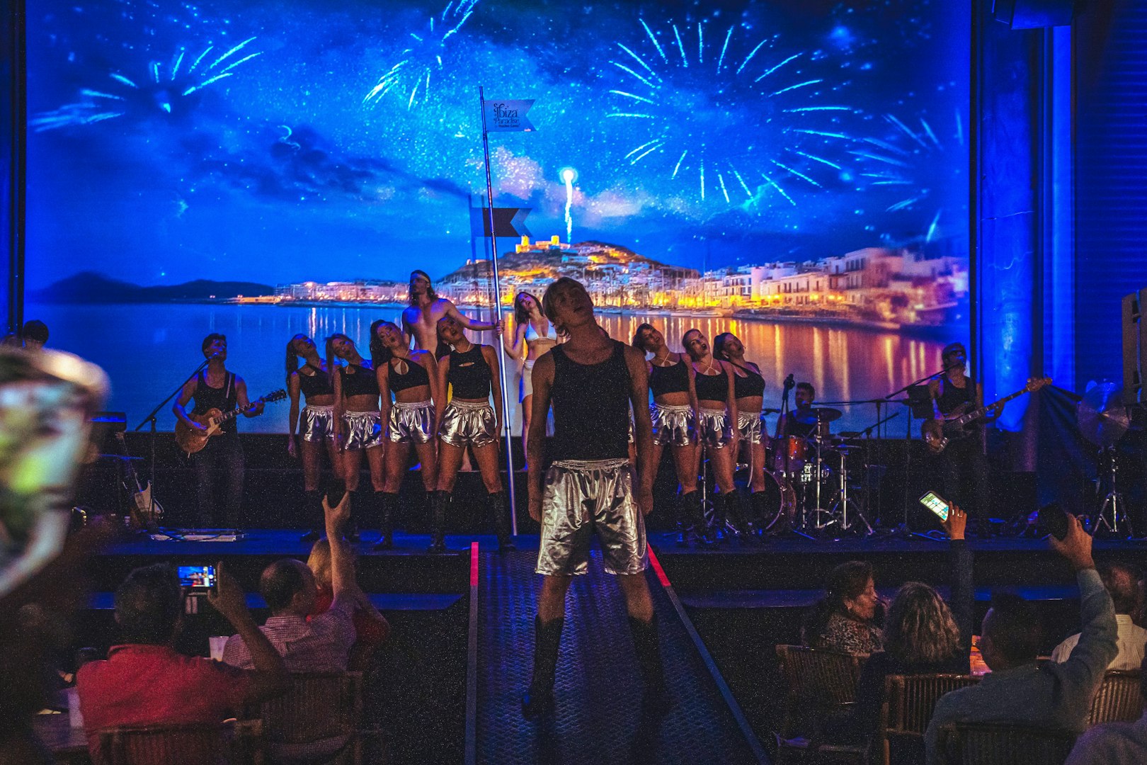 Stage performance at Ibiza Paradise by Nacho Cano, Madrid show with dancers and musicians.