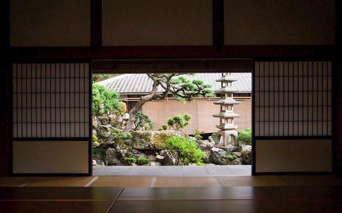 Zazen meditation room view of garden and stone pagoda at Kosho-ji Temple.