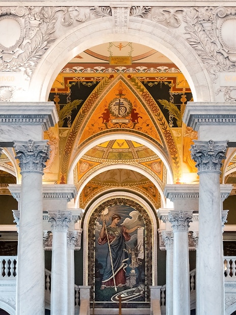 Library of Congress interior with ornate arches and columns, Washington D.C.