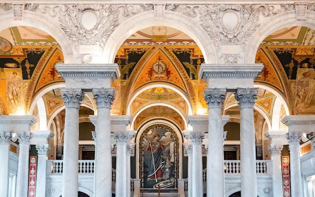 Library of Congress interior with ornate arches and columns, Washington D.C.