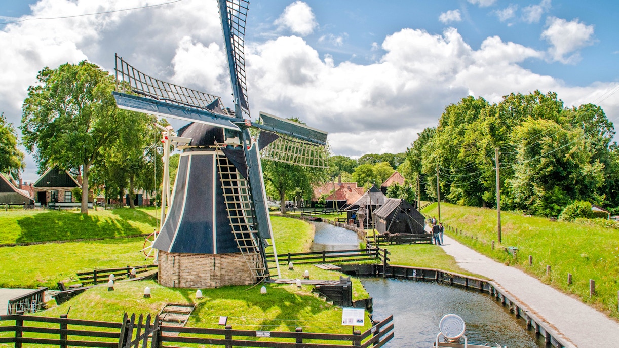 Windmill and canal at Zuiderzee Museum, Enkhuizen.