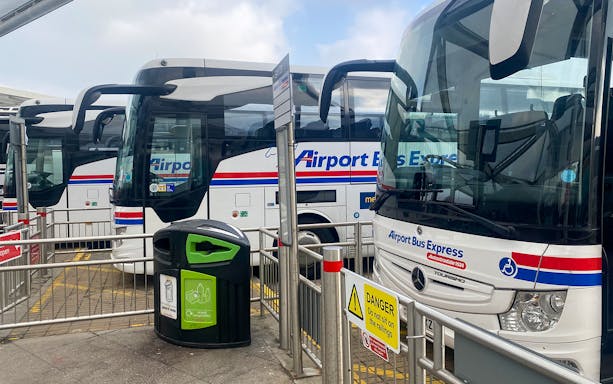 Airport Bus Express coaches at London Stansted Airport terminal.