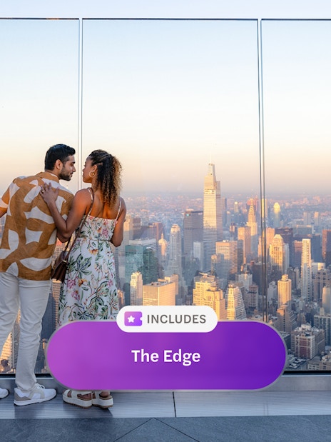 Couple enjoying New York City skyline view from Edge at Hudson Yards.