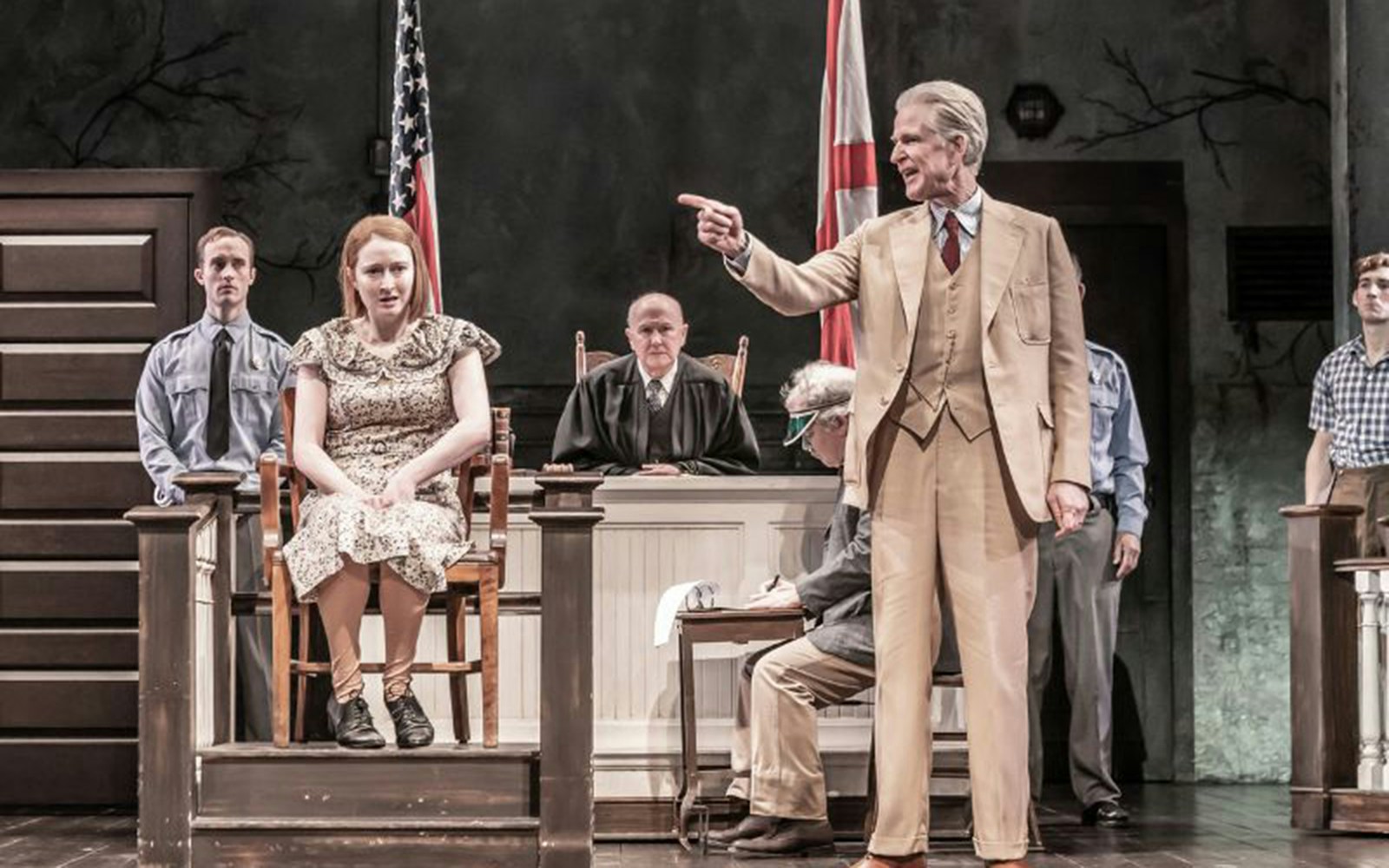 Courtroom scene from "To Kill a Mockingbird" play with a lawyer addressing the jury.