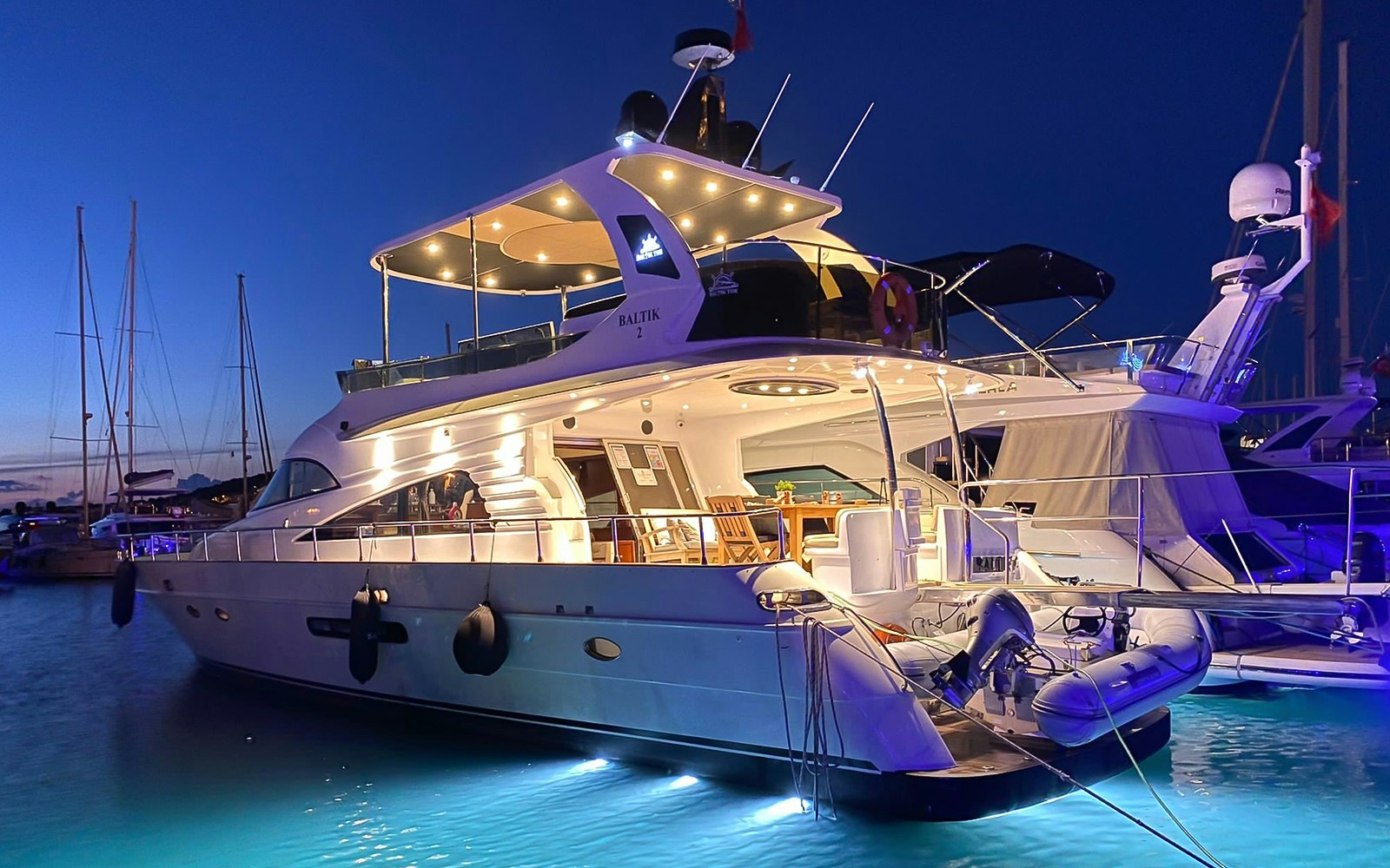 Bosphorus luxury private yacht cruising near Istanbul's iconic skyline.