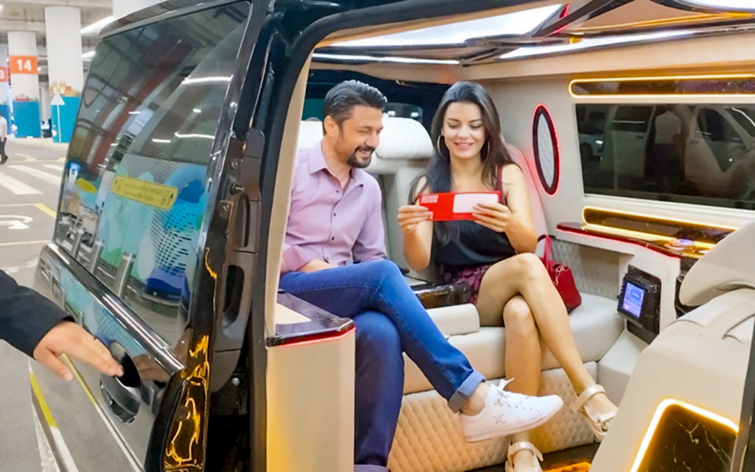 Private transfer at Sabiha Gokcen Airport, Istanbul, with passengers in luxury van.