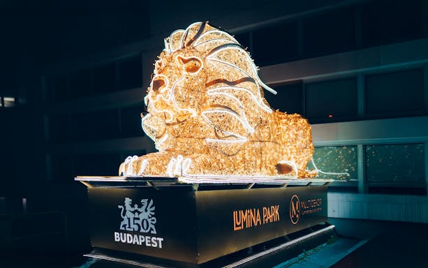 Lion-shaped light sculpture at Lumina Park, Budapest.