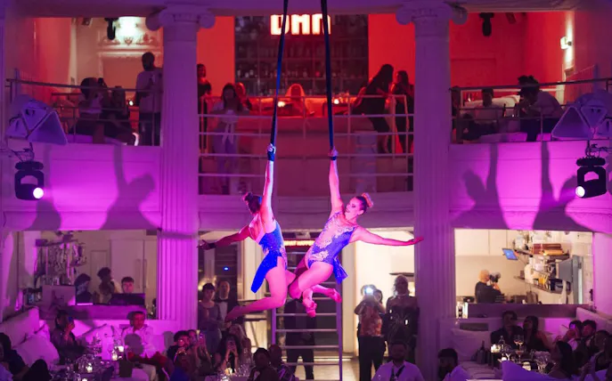 Aerial performers at famous dinner show in Supper Restaurant.