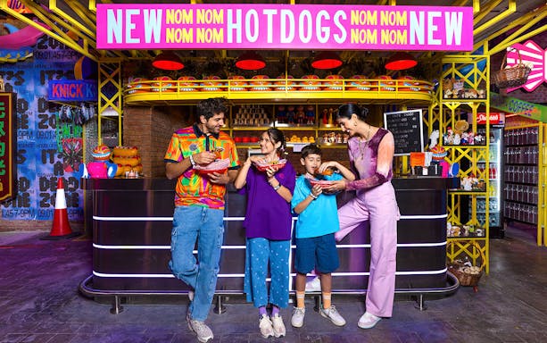 Dubai House of Hype interior with vibrant lights and interactive exhibits, highlighting the Kids Go Free offer.