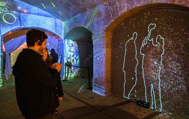 Visitors exploring interactive displays at the Mysterious Egypt exhibition.