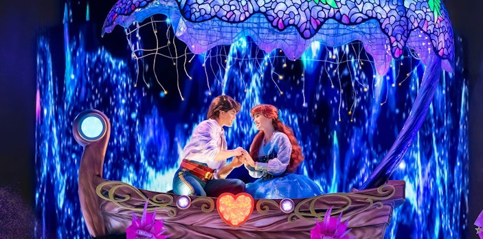 Characters in a boat during a performance at Tokyo Disneyland's DisneySea.