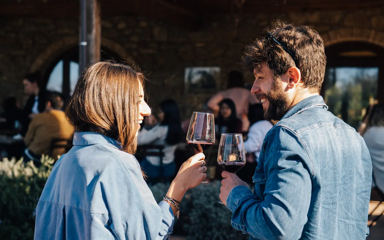 Couple enjoying wine tasting on Chianti Half Day Tour from Florence.