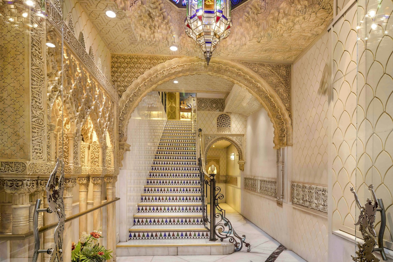 Tablao Cordobes interior with ornate arches and decorative staircase in Barcelona.