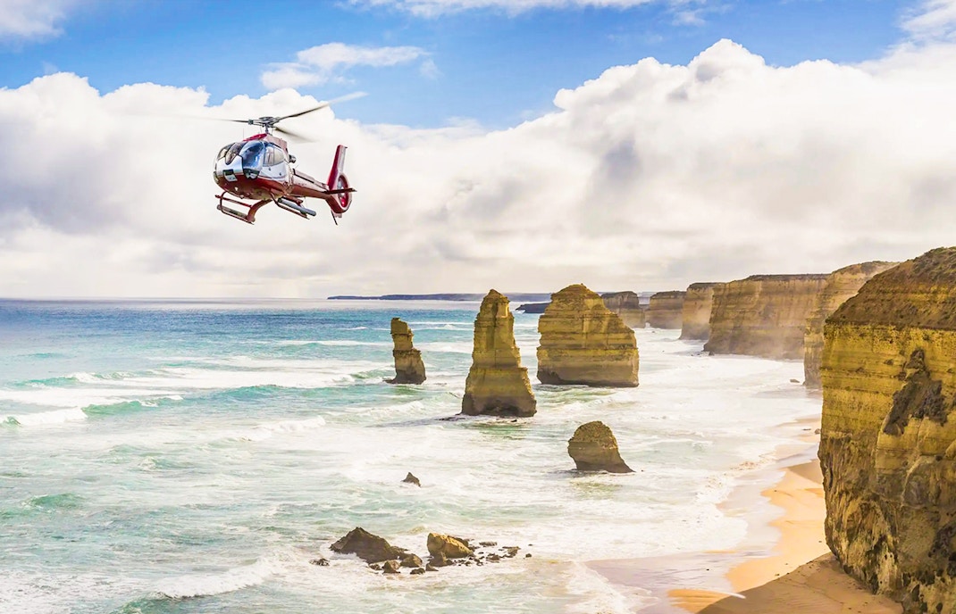 Aerial view of the Great Ocean Road coastline during a helicopter tour in Australia.