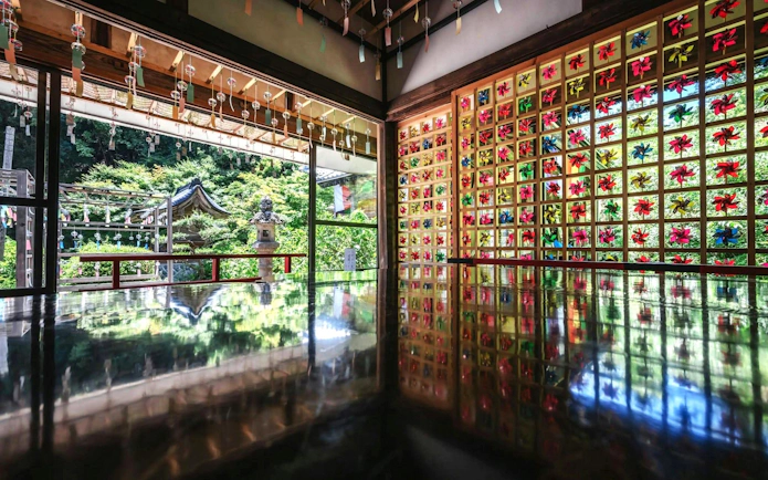 Wind chimes and colorful art installation at Kyoto Summer Limited Wind Chime Festival.