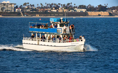 Sightseeing cruise boat with passengers in Los Angeles Harbor.