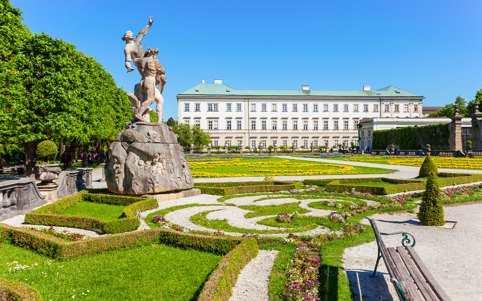 Mirabell Palace gardens with Pegasus statue and floral designs, Salzburg.